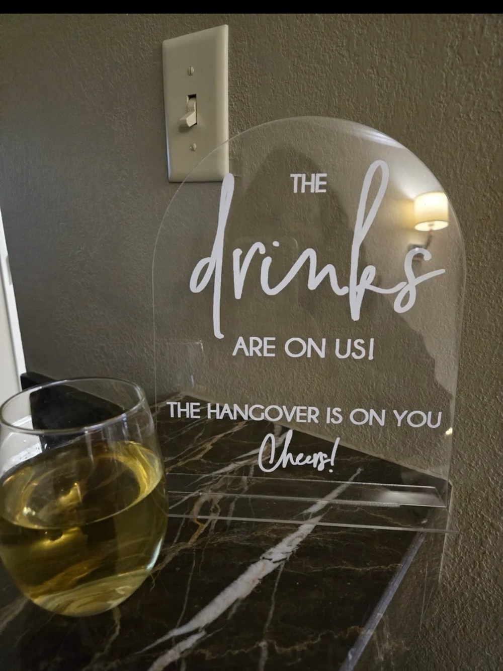 Clear Acrylic 'Drinks Are On Us' Sign - White Lettering